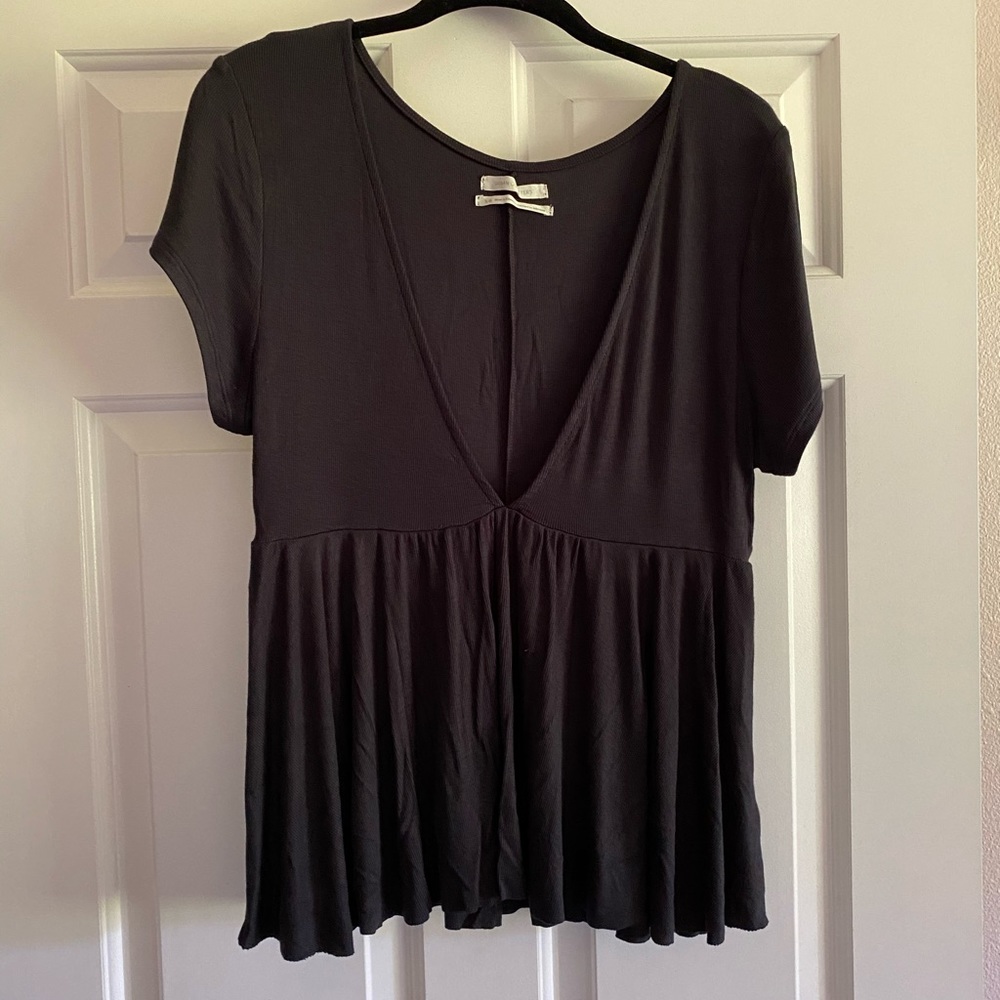 Brand new black short sleeve with deep v neck